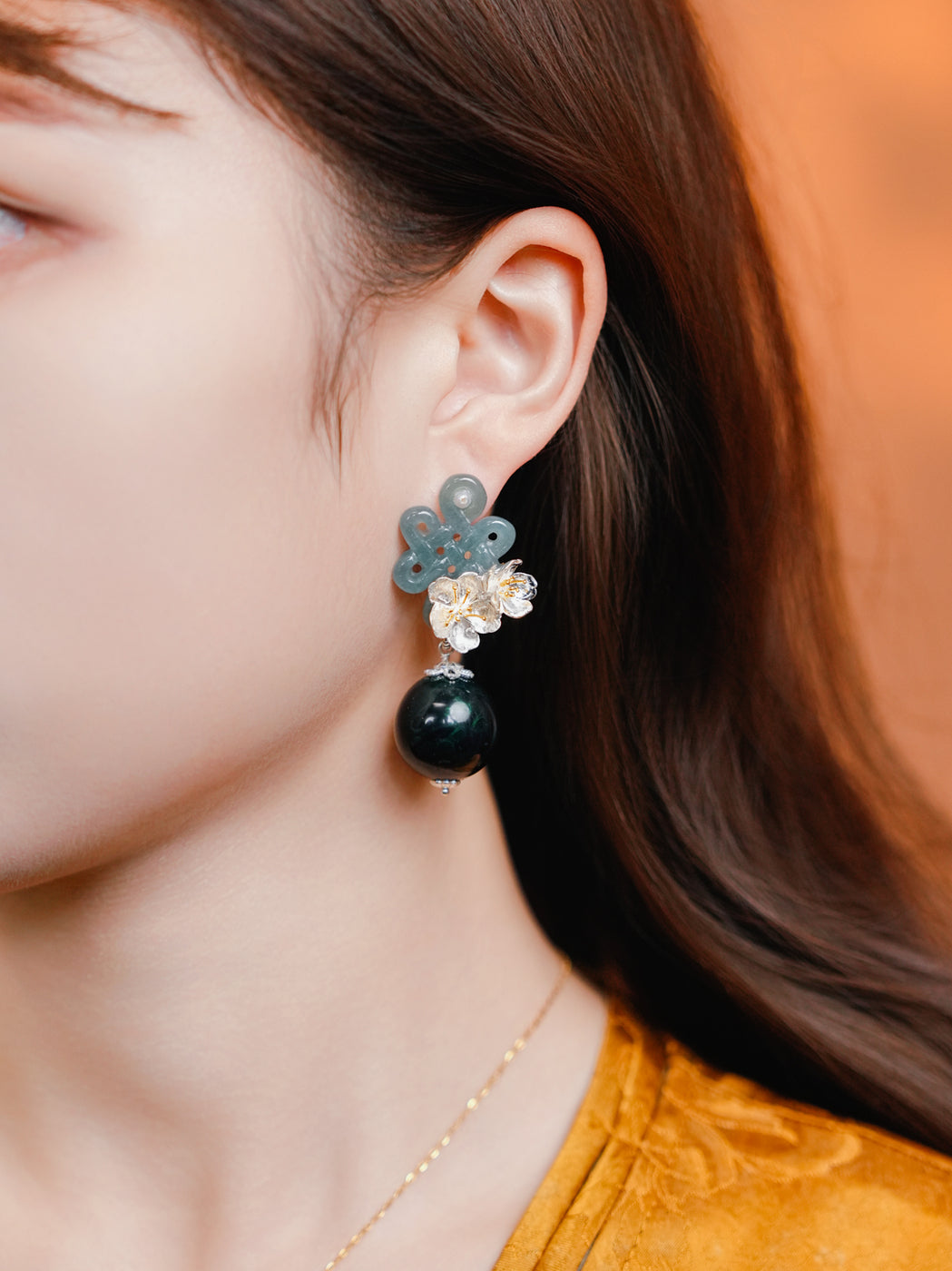 【YIN YIN】AoreginHandcrafted Chinese lacquer earrings featuring jade knot, green gemstone beads, silver cherry blossoms, and traditional craftsmanship
