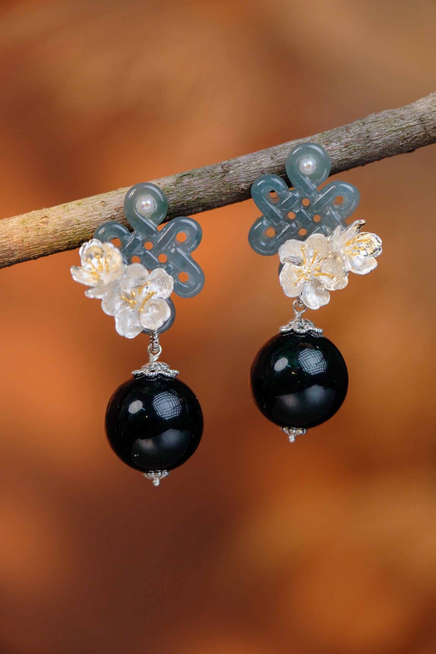 【YIN YIN】AoreginHandcrafted Chinese lacquer earrings featuring jade knot, green gemstone beads, silver cherry blossoms, and traditional craftsmanship