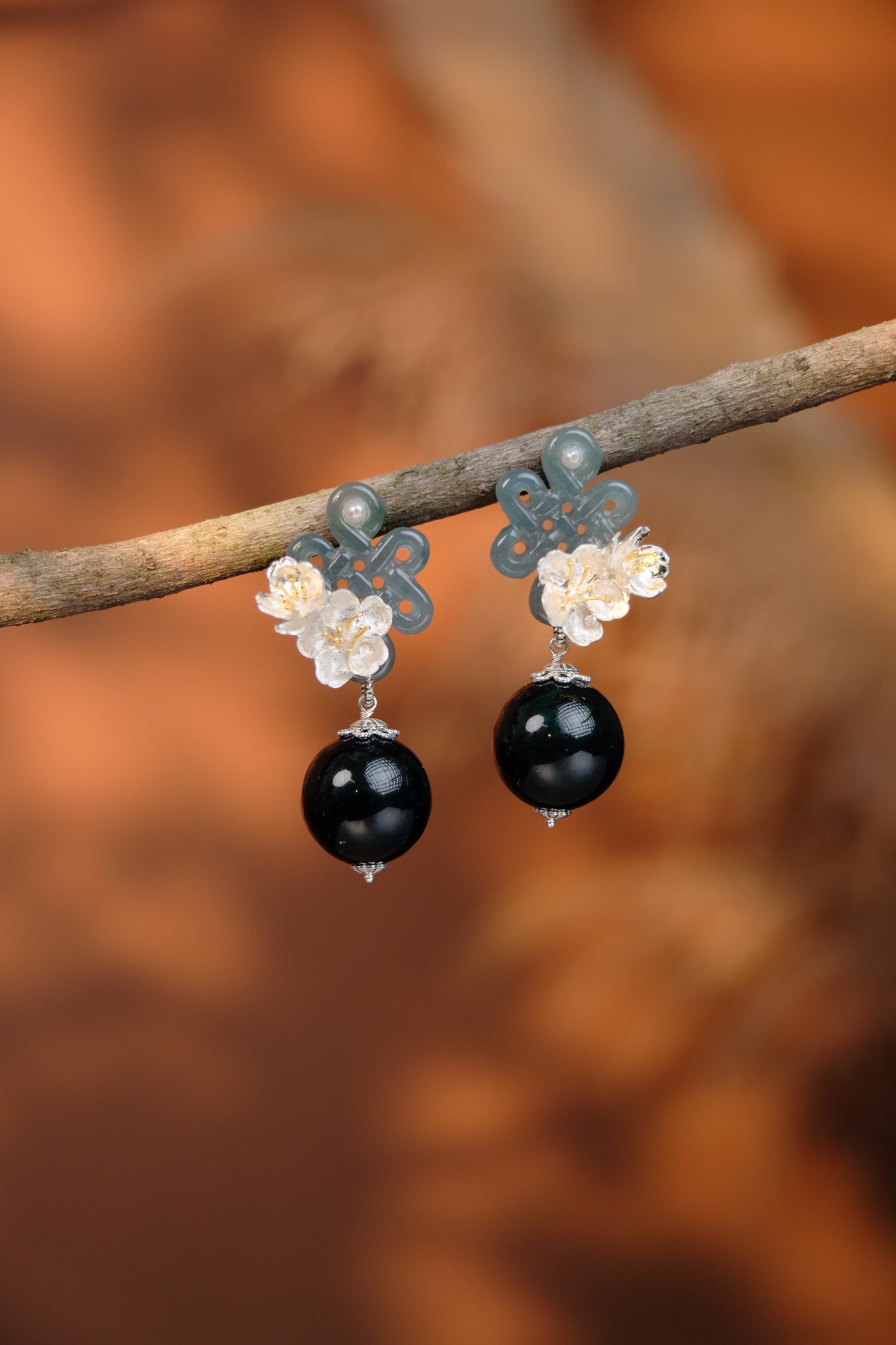【YIN YIN】AoreginHandcrafted Chinese lacquer earrings featuring jade knot, green gemstone beads, silver cherry blossoms, and traditional craftsmanship